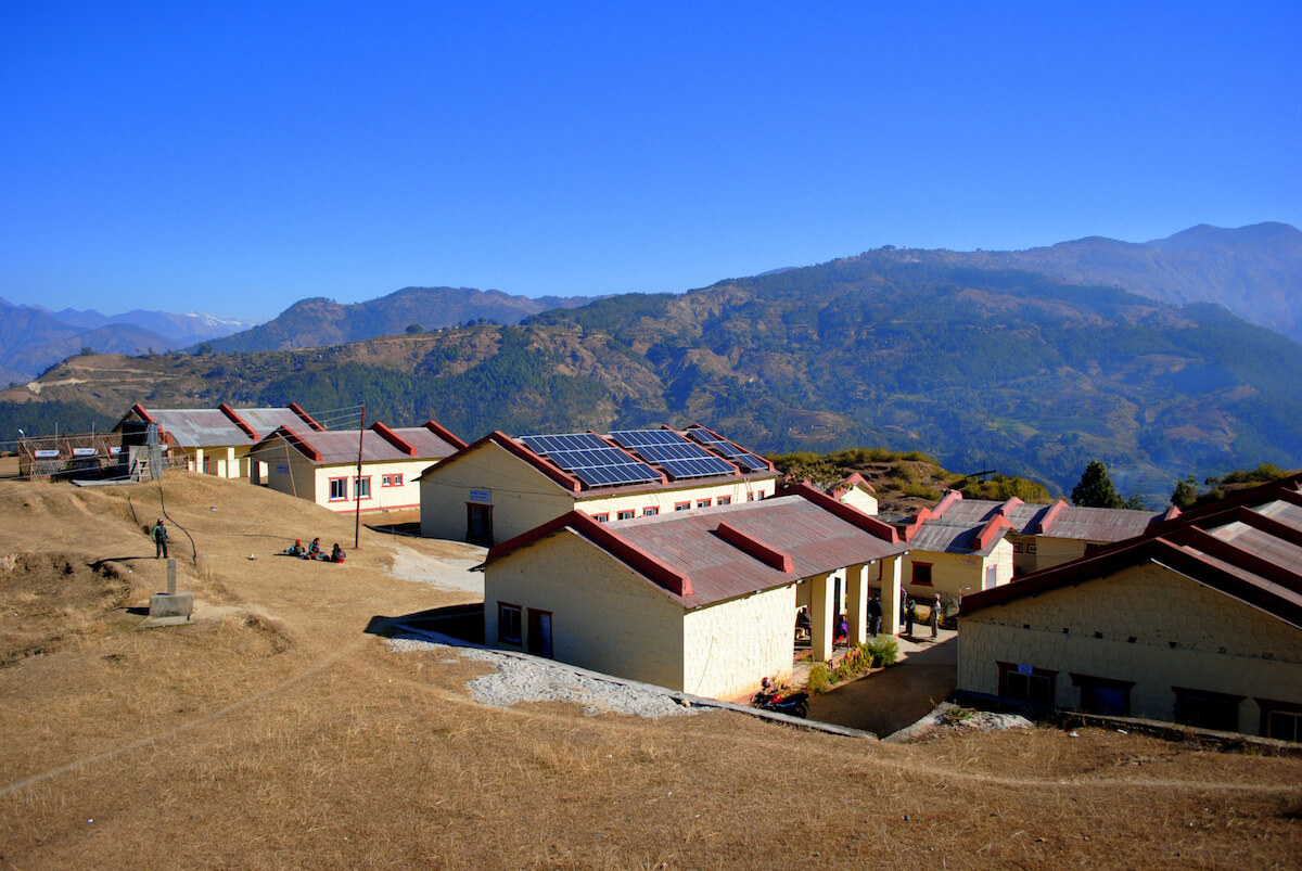 Buildings in Nepal with solar panels from SunFarmer