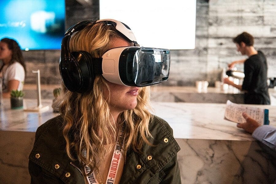 Woman wearing Samsung VR virtual reality headset