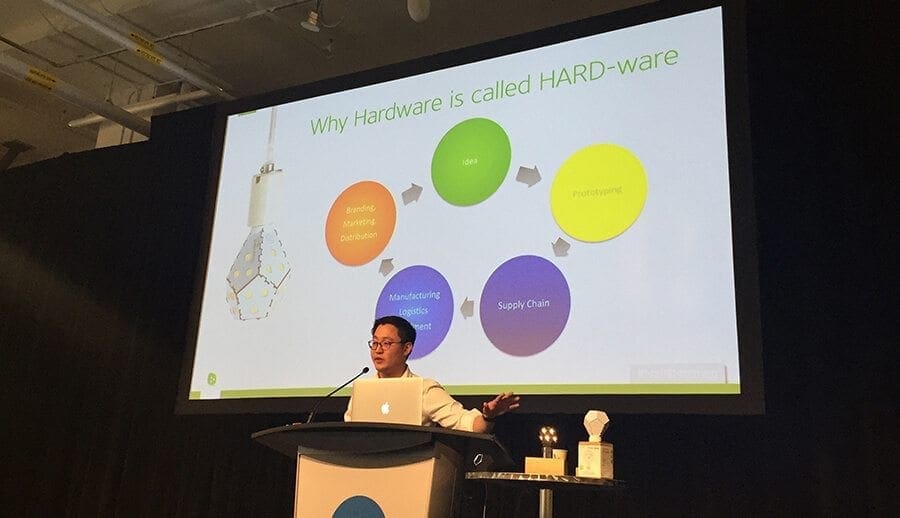 Gimmy Chu of Nanoleaf speaking at MaRS Mornings, presenting the "Why Hardware is called HARD-ware" slide.