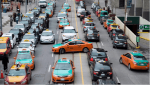 taxi drivers protesting in Toronto by blocking roadways